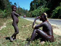 A Jarawa man and boy by the side of the Andamans Trunk Road